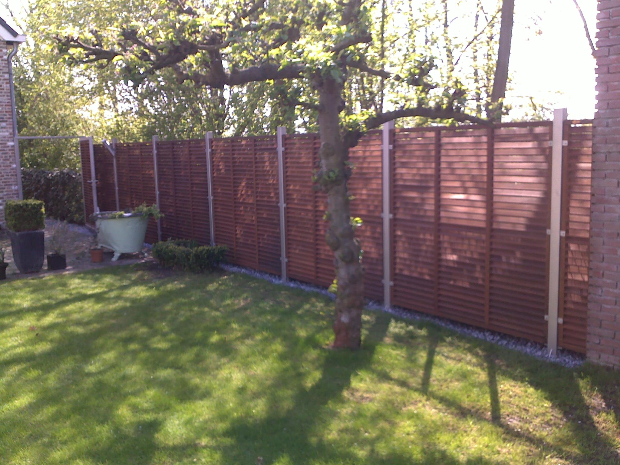 RVS schuttingpalen met Bankirai schuttingdelen